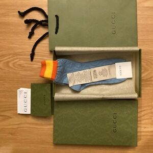 Authentic Gucci GG-jacquard web-striped cotton-blend socks.